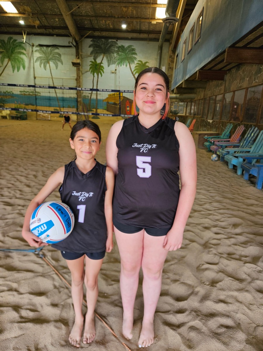 Just Dig It VC players #1 and #5 on the indoor sand at The Island